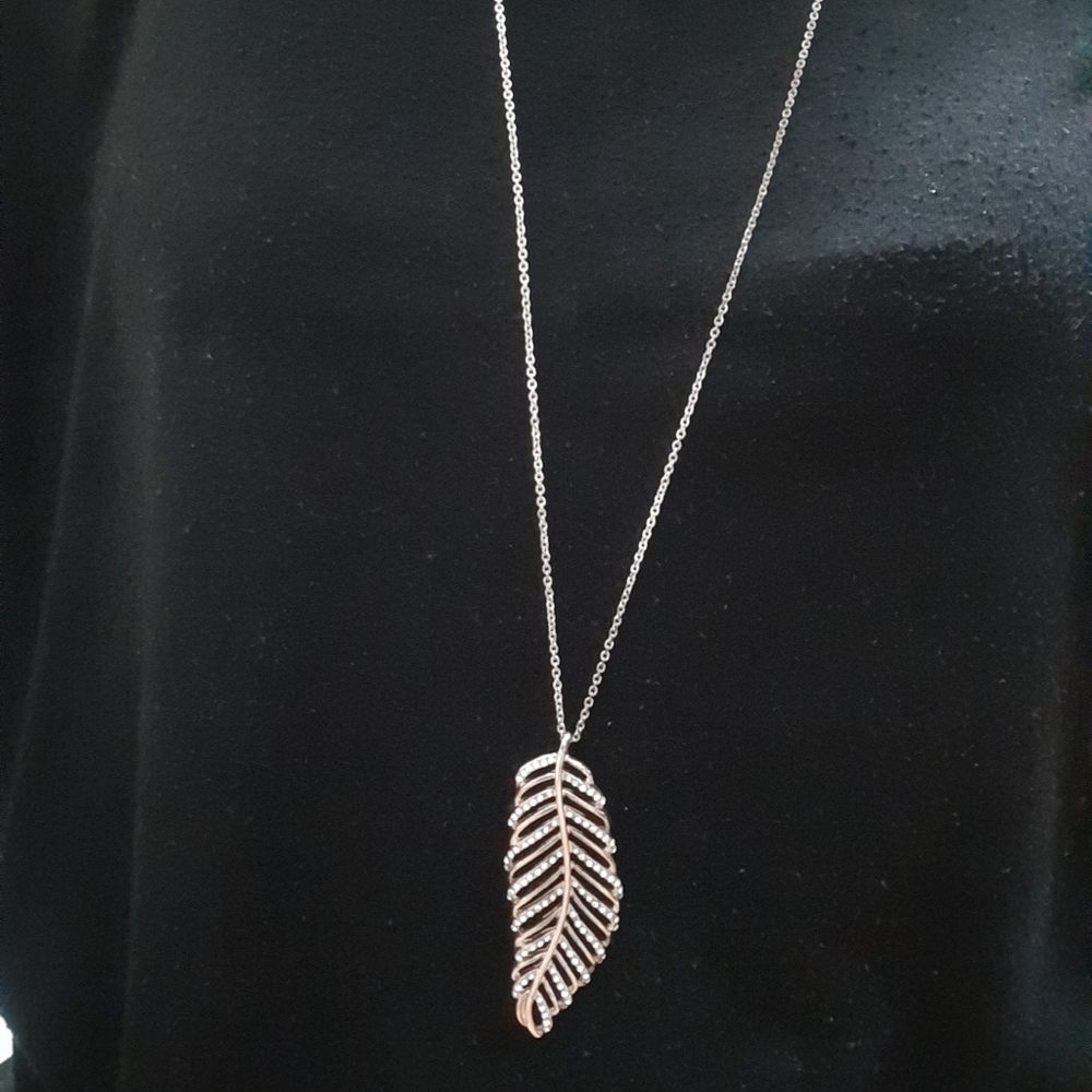 Long golden jewelled feather necklace